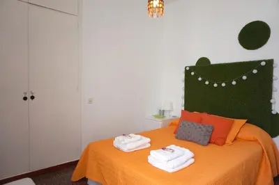Cama o camas de una habitación en Mai City Apartment