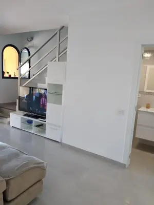 Una televisión o centro de entretenimiento en Bahía Meloneras 2