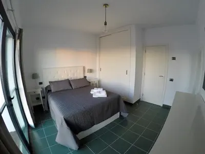 Cama o camas de una habitación en Altos de Arguineguín