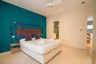 Cama o camas de una habitación en Africa Master Suite 3 bedrooms. Aire acondicionado