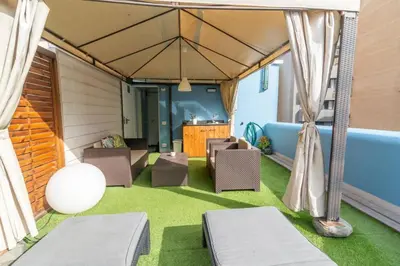 Zona de estar de Africa Master Suite 3 bedrooms. Aire acondicionado