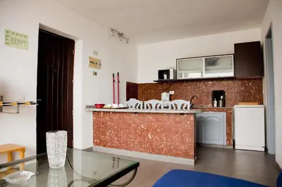 Una cocina o zona de cocina en Apartamentos Miriam
