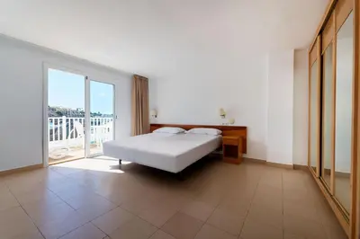 Cama o camas de una habitación en Servatur Altamadores