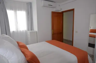 Cama o camas de una habitación en Armonía Beach 15