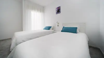 Cama o camas de una habitación en Armonía Beach 15