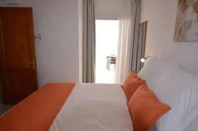 Cama o camas de una habitación en Armonía Beach 15