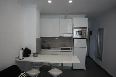 Una cocina o zona de cocina en Black & White Las Canteras
