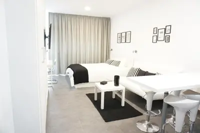 Zona de estar de Black & White Las Canteras