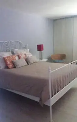 Cama o camas de una habitación en Primera linea de Playa de las Burras