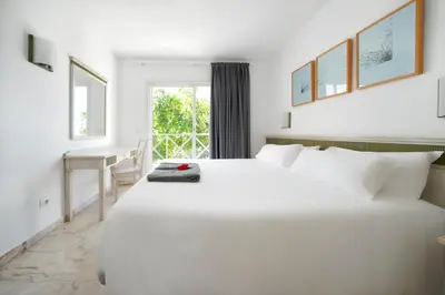 Cama o camas de una habitación en Vista Bonita - Gay and Lesbian Only Resort