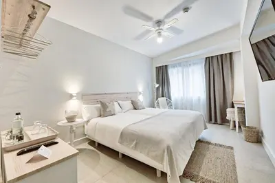 Cama o camas de una habitación en Maresía Canteras Urban Hotel