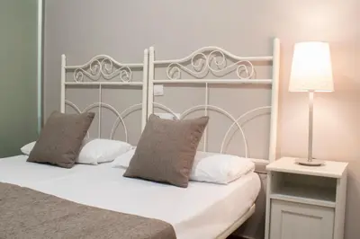 Cama o camas de una habitación en TC Lindamar