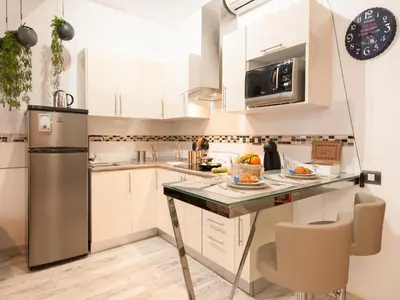 Una cocina o zona de cocina en La Barca M&B II studio close to Las Canteras by VillaGranCanaria