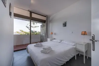 Cama o camas de una habitación en Vista Dorada al mar balcón-Wifi By CanariasGetaway