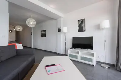 Una televisión o centro de entretenimiento en Vista Dorada al mar balcón-Wifi By CanariasGetaway