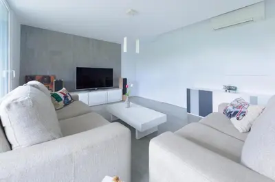 Una televisión o centro de entretenimiento en Villa Palmera