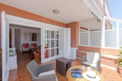 Zona de estar de Apartment with Terrace on the Beachfront.
