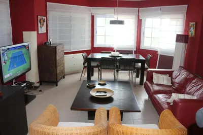 Una televisión o centro de entretenimiento en Vivienda Las Velas