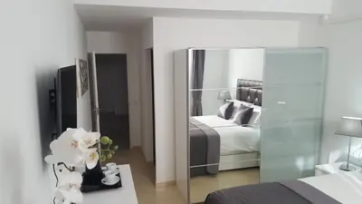 Cama o camas de una habitación en VillaFonzie Adults Only Gayfriendly