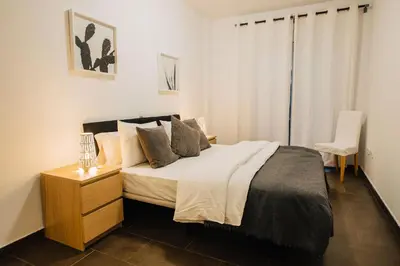 Cama o camas de una habitación en Cornisa Apartments