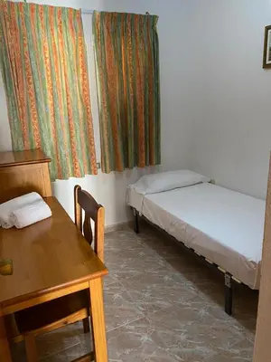 Cama o camas de una habitación en Ura Hotels Apartamentos Montecarlo