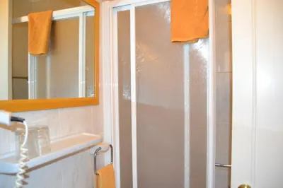 Un baño de Apartamentos Don Quijote