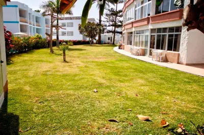 Jardín al aire libre en Bonito Apartamento 105 by CASAS COCODRILO