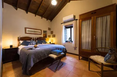Cama o camas de una habitación en Bohemian Hideaway Finca - 2 unique houses with shared pool