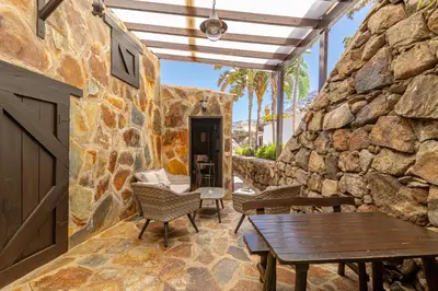 Un patio o zona al aire libre en Casa Los Pinos