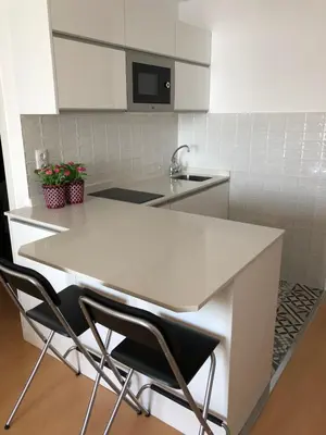 Una cocina o zona de cocina en Apartamento en primera línea playa