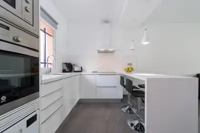 Una cocina o zona de cocina en BUNGALOW BAHÍA MELONERAS