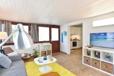 Una televisión o centro de entretenimiento en Casa Maspalomas