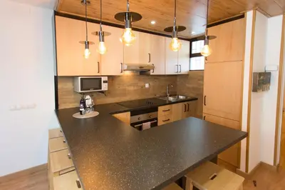 Una cocina o zona de cocina en Palm Friendly Holiday Home
