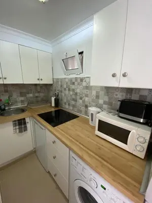Una cocina o zona de cocina en Ocean Breeze San Agustin