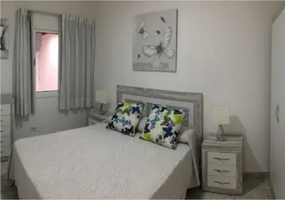 Cama o camas de una habitación en Billy's Las Rocas Apt Playa de Mogan with pool access