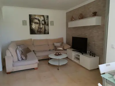 Una televisión o centro de entretenimiento en Tara apartment