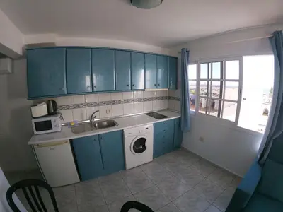 Una cocina o zona de cocina en Apartamentos Ernesto