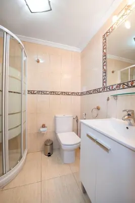 Un baño de nikis Flat