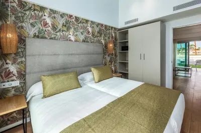 Cama o camas de una habitación en Kumara Serenoa By Lopesan Hotels