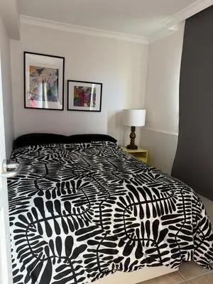 Cama o camas de una habitación en Beach line apartment