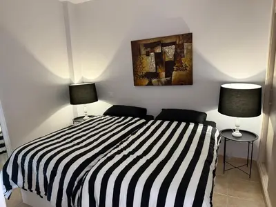 Cama o camas de una habitación en Beach line apartment