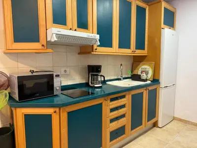 Una cocina o zona de cocina en Beach line apartment