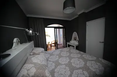 Cama o camas de una habitación en Avenida de la Cornisa 11
