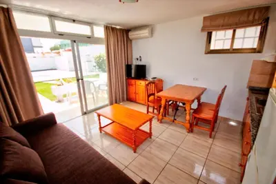 Zona de estar de Apartamento al lado de la playa by CASAS COCODRILO