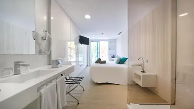 Cama o camas de una habitación en Seven Hotel & Wellness - Gay Men Only