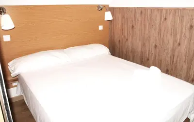 Cama o camas de una habitación en Tropical Friendly Holiday Home