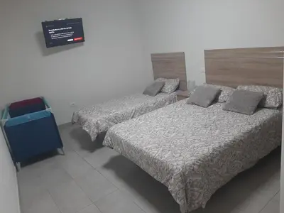 Cama o camas de una habitación en El Puente Holiday Home -Airport