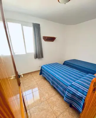 Cama o camas de una habitación en Apartamentos Sandra