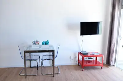 Una televisión o centro de entretenimiento en Apartamento Primera Línea Playa de Las Canteras