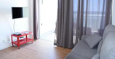 Una televisión o centro de entretenimiento en Apartamento Primera Línea Playa de Las Canteras